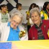 Bernadine Sitts (left) with her sister, celebrating her birthday with students at the Bernadine Sitts Intermediate Center